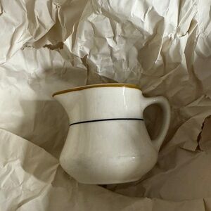 White Ceramic Pitcher with Yellow Rim